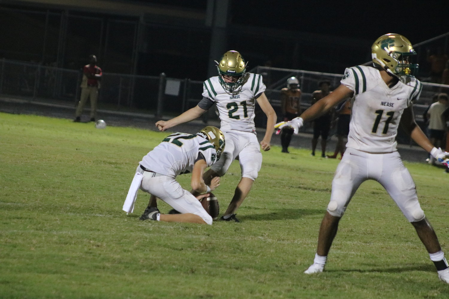 Cannon Kimball kicks a field goal from the hold of Evan Crenshaw earlier in the year. He kicked the game-winning 26-yard field goal with 18 seconds left to beat Port Orange Spruce Creek in the first round of the 7A playoffs.